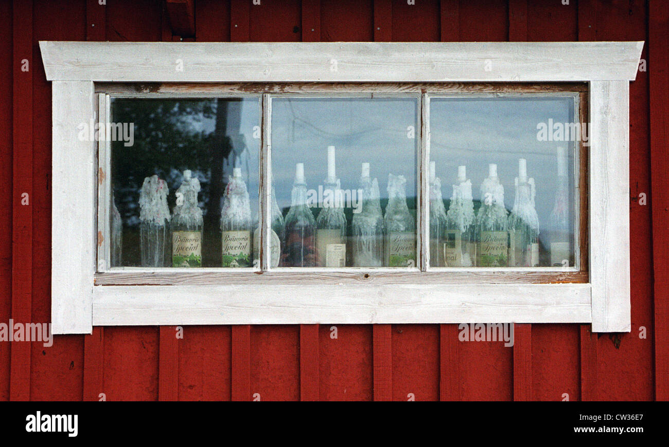 Bottles candles in a window, Sweden Stock Photo Alamy