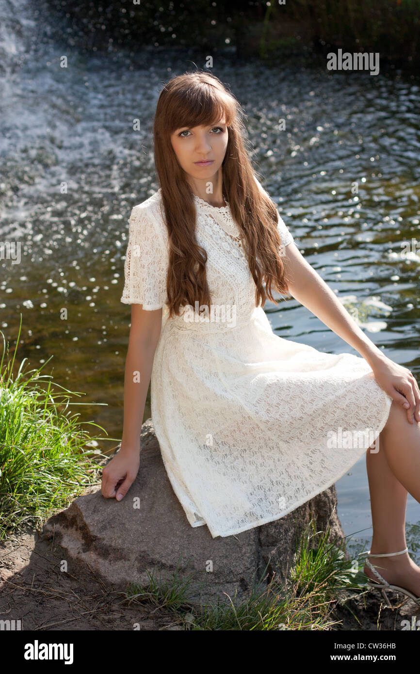 Sad girl water lake hi-res stock photography and images - Alamy
