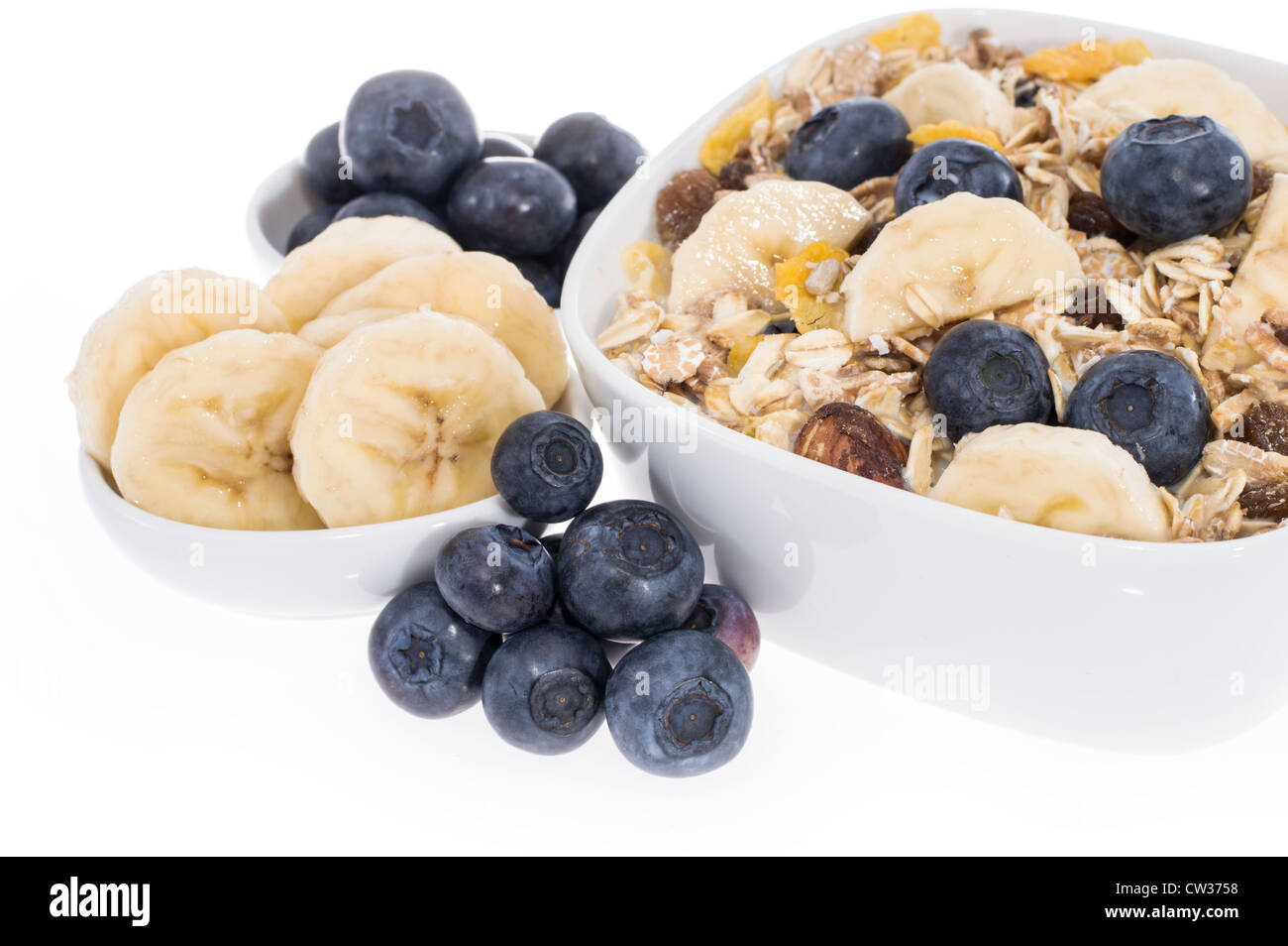 Mixed Muesli with Blueberries and Bananas isolated on white background Stock Photo