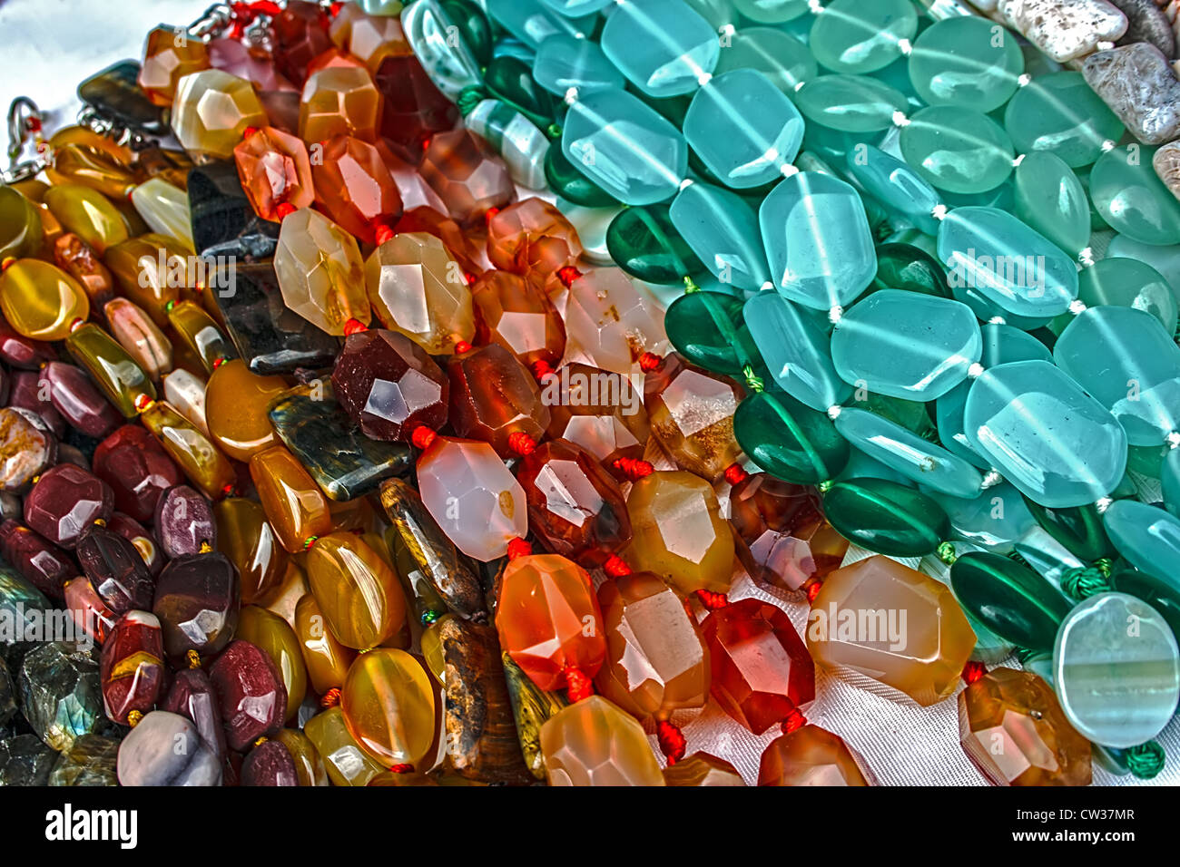 Different colored trinkets displayed in the waiting customers Stock