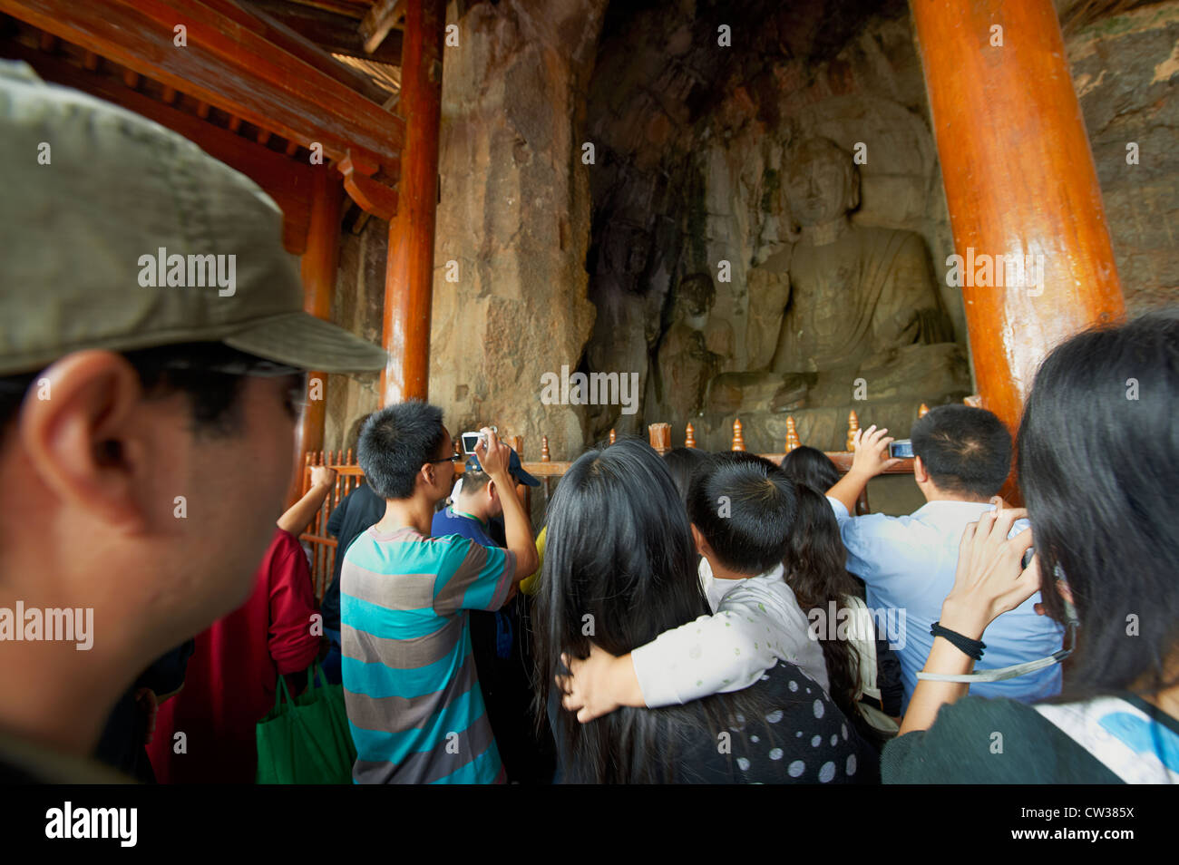 Tourists at The Longmen (Dragon's Gate) Grottoes in Luoyang, China Stock Photo