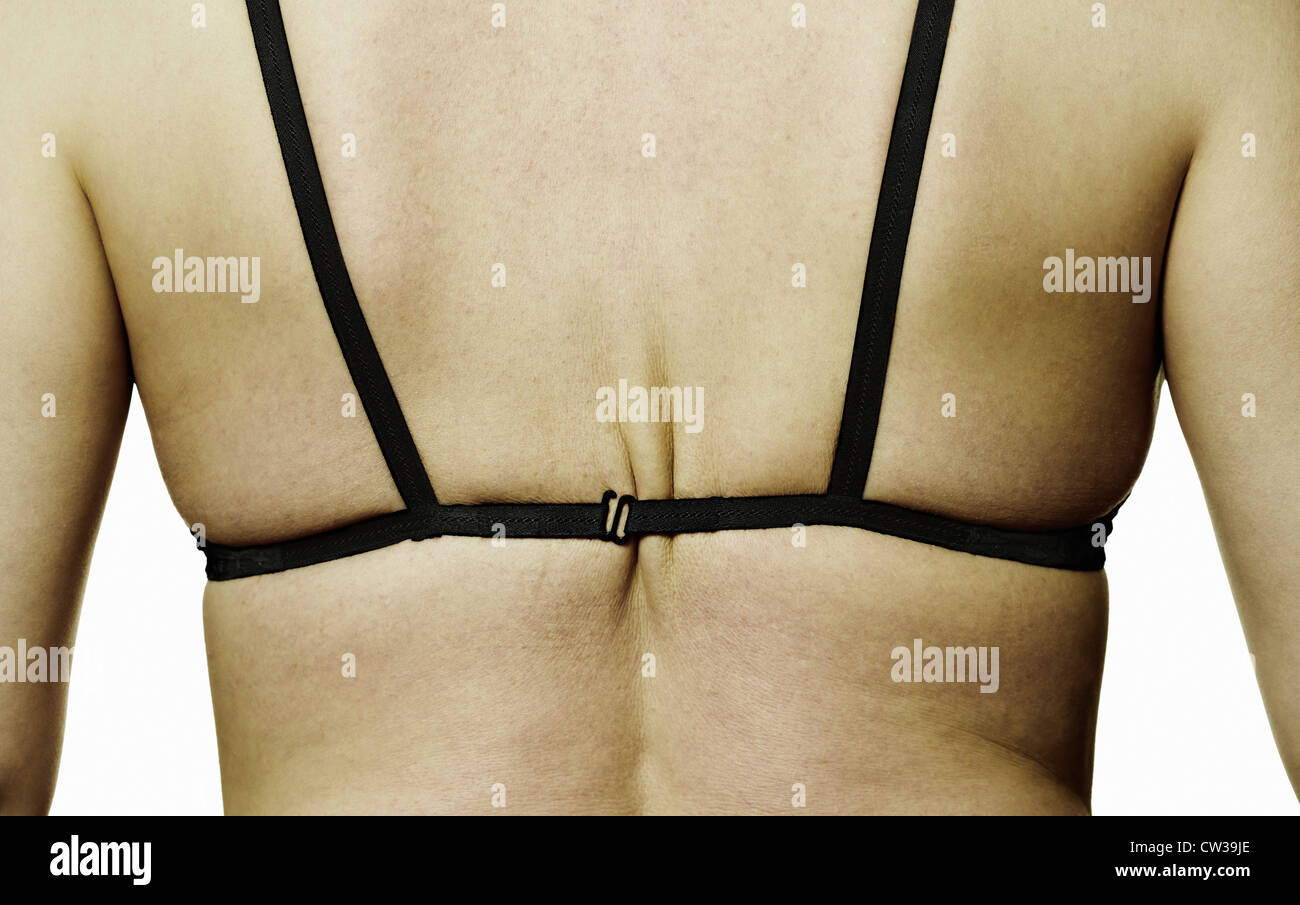 Woman wearing tight bra, rear view Stock Photo Alamy