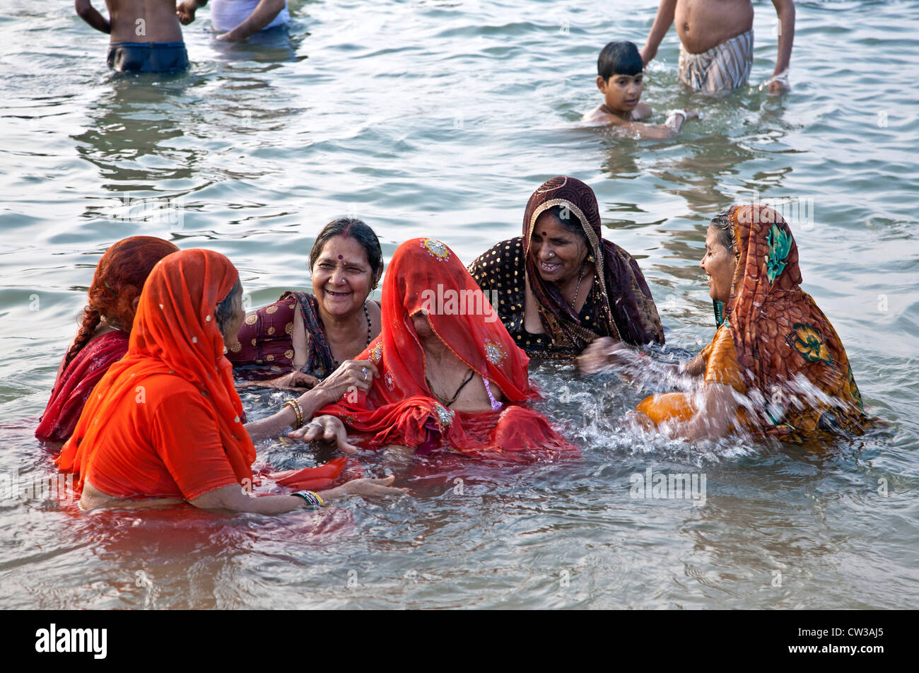 Hindu women bathing in the sea. Kanyakumari. Cape Comorin. India Stock Photo