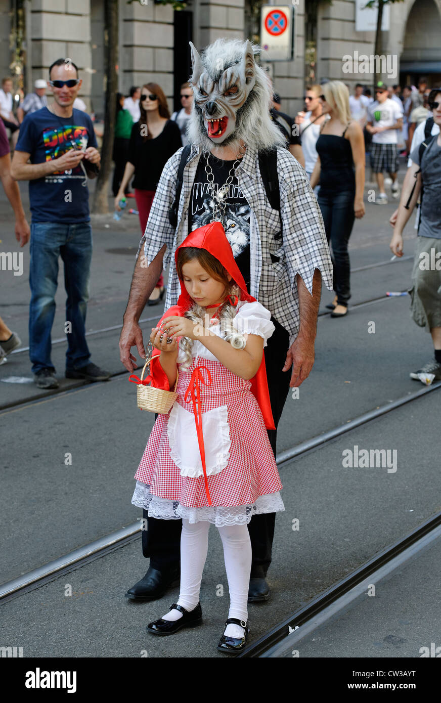 Red Riding Hood and the Wolf - two revelers at the Zurich Street Parade, a techno and trance festival. Stock Photo