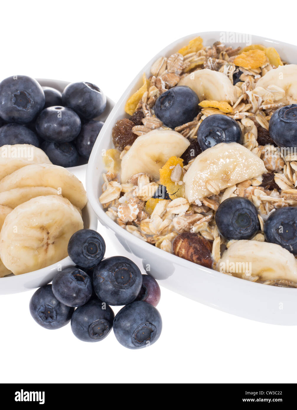 Mixed Muesli with Blueberries and Bananas isolated on white background Stock Photo