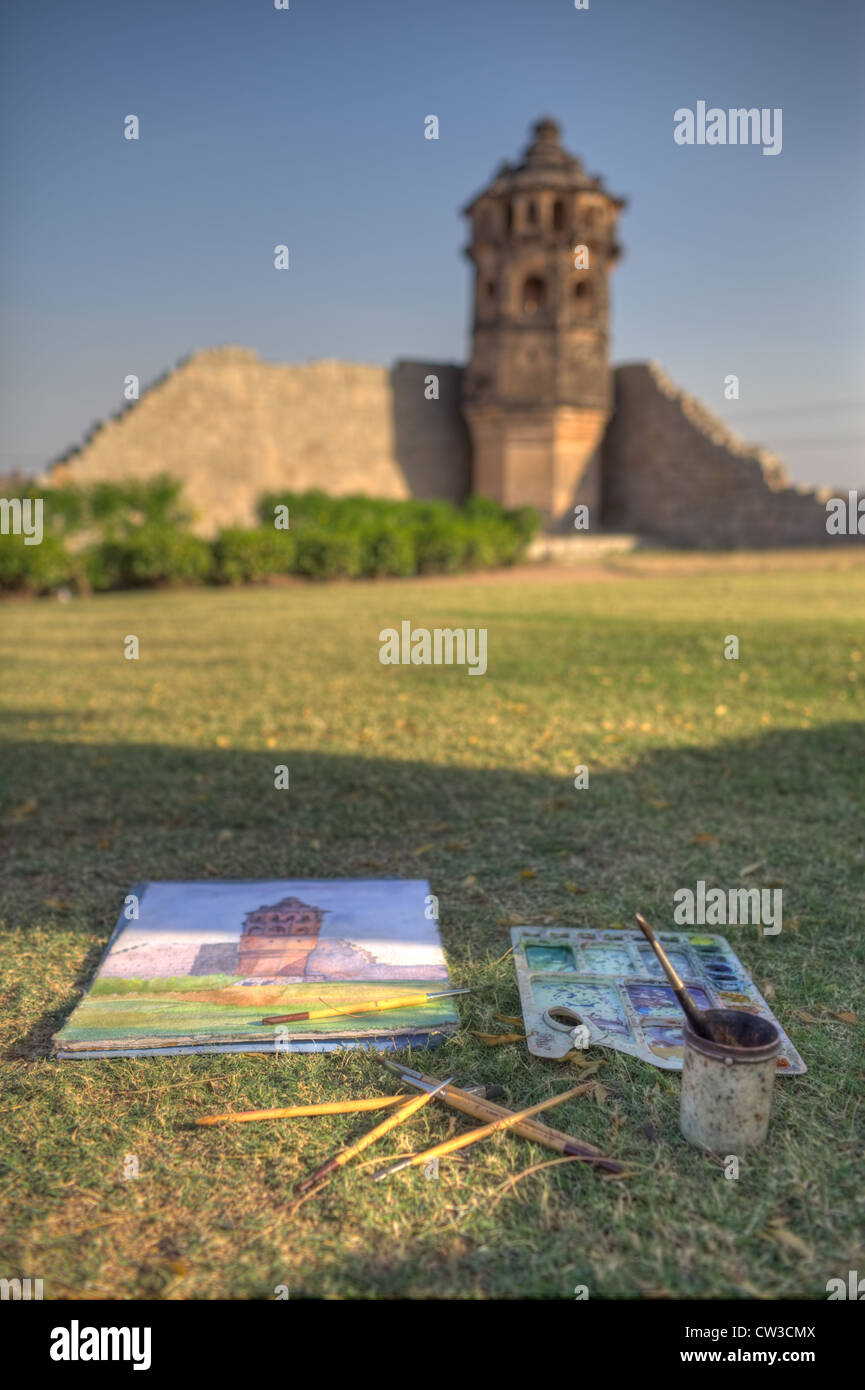 Painting the guard towers in the Royal Enclosure in Hampi. Stock Photo