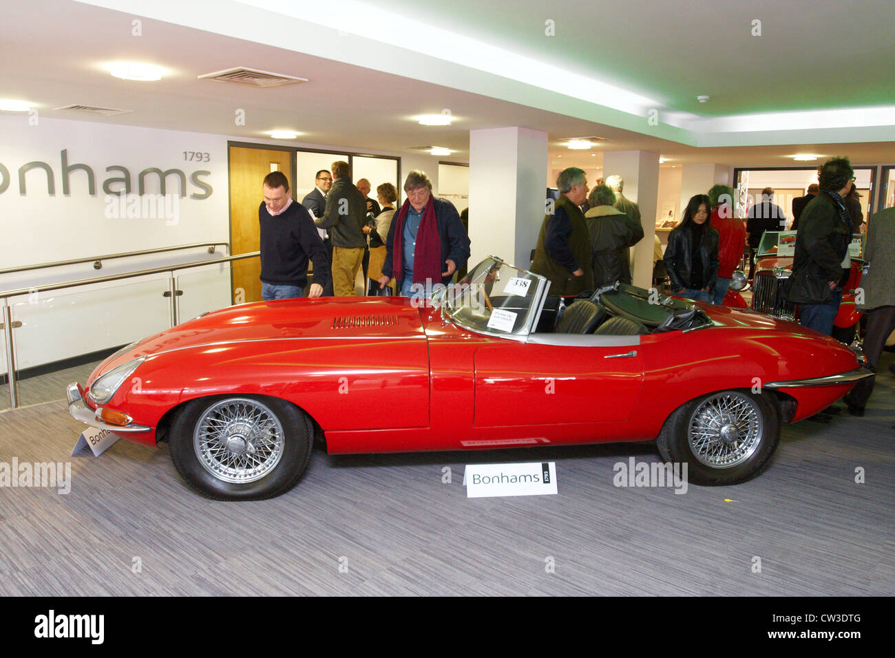 A red 1965 Jaguar E-Type Series 1 4.2 litre Roadster (pictured) that previously belonged to Sir Elton John Stock Photo