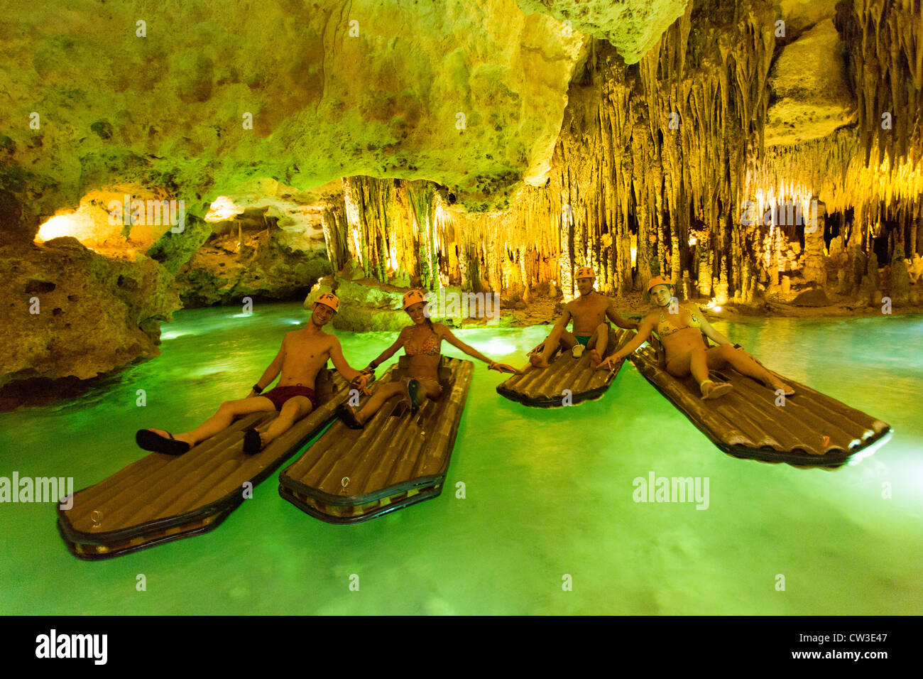 Mexico, Mayan Riviera,Xplor Adventure Park,people rafting on river in a cenote Stock Photo