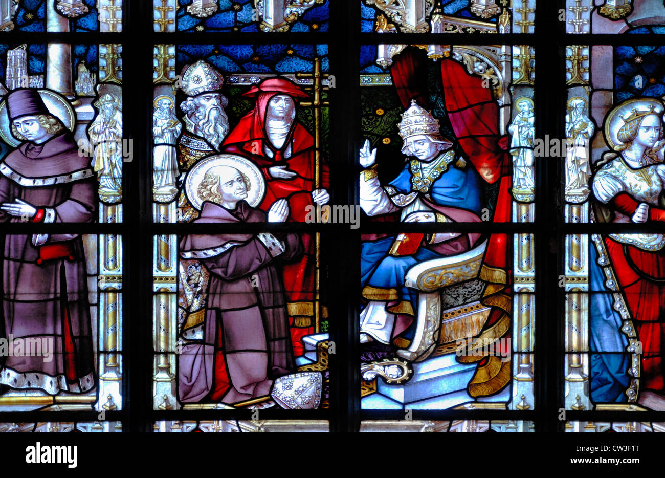 Brussels, Belgium. Eglise St Boniface Church. Stained Glass Window - the abdication of St Boniface in front of Pope Gregory Stock Photo