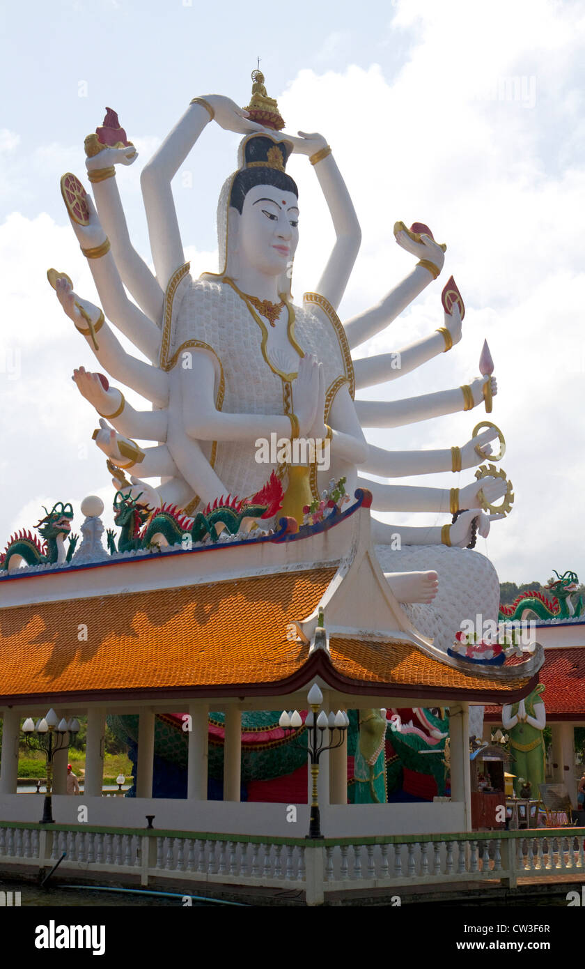 18 arm Buddha statue at Wat Plai Laem temple located on the island of Ko Samui, Thailand. Stock Photo