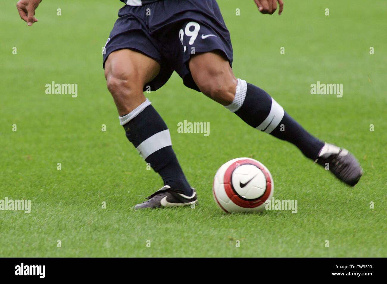 Berlin, Soccer player in action Stock Photo