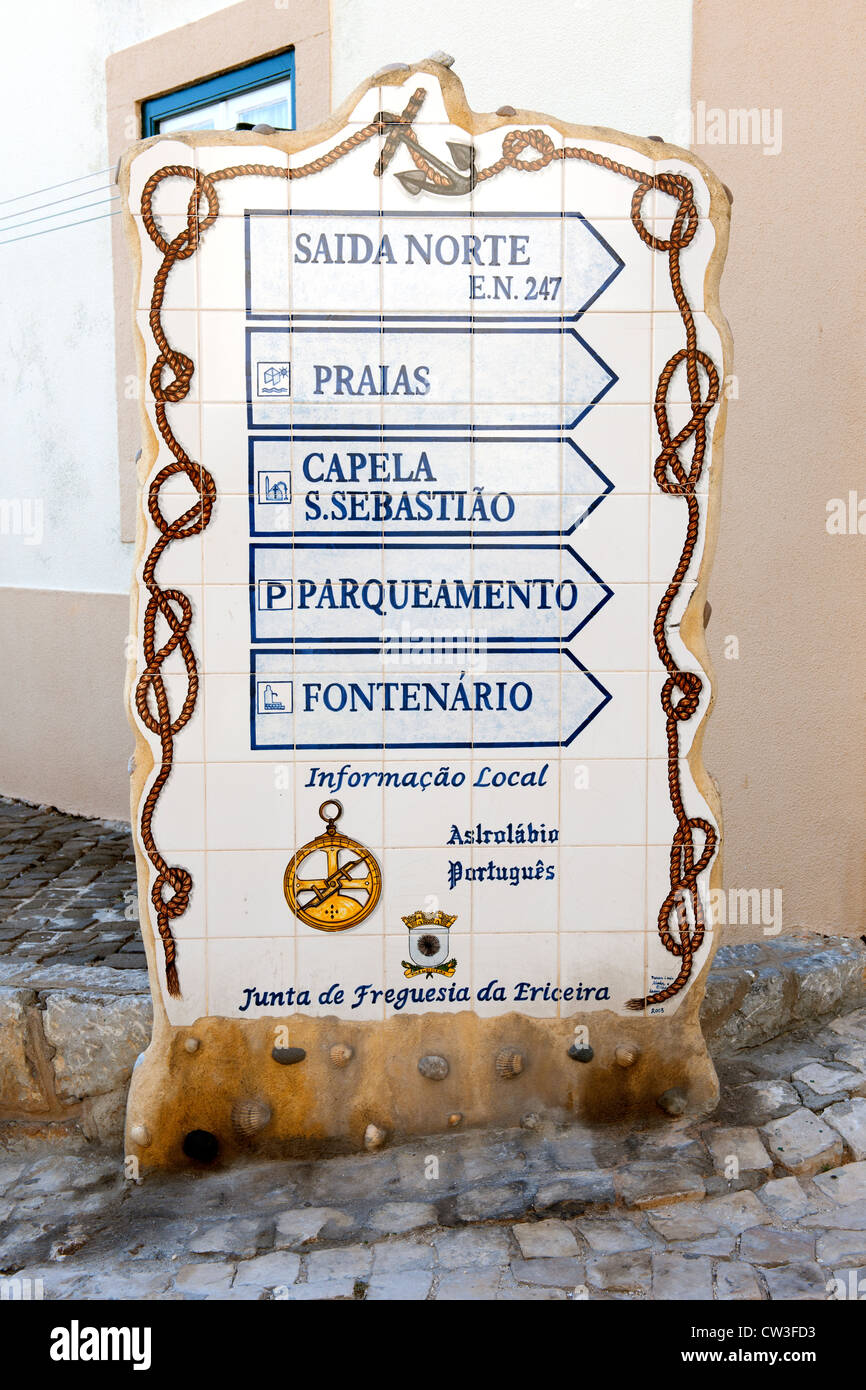 An elaborate direction sign in Ericeira, Lisbon Coast, Portugal. Stock Photo