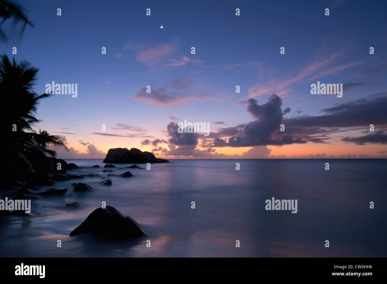 Sunset over beach.Cousine Island.Seychelles Stock Photo