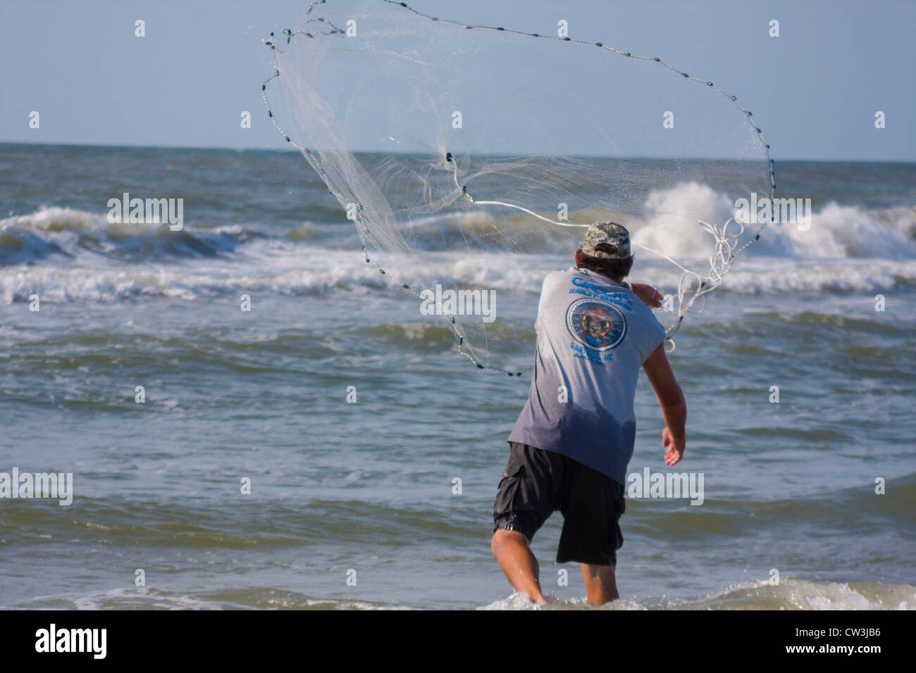 Cast Net Fishing For Bait Stock Photo Alamy