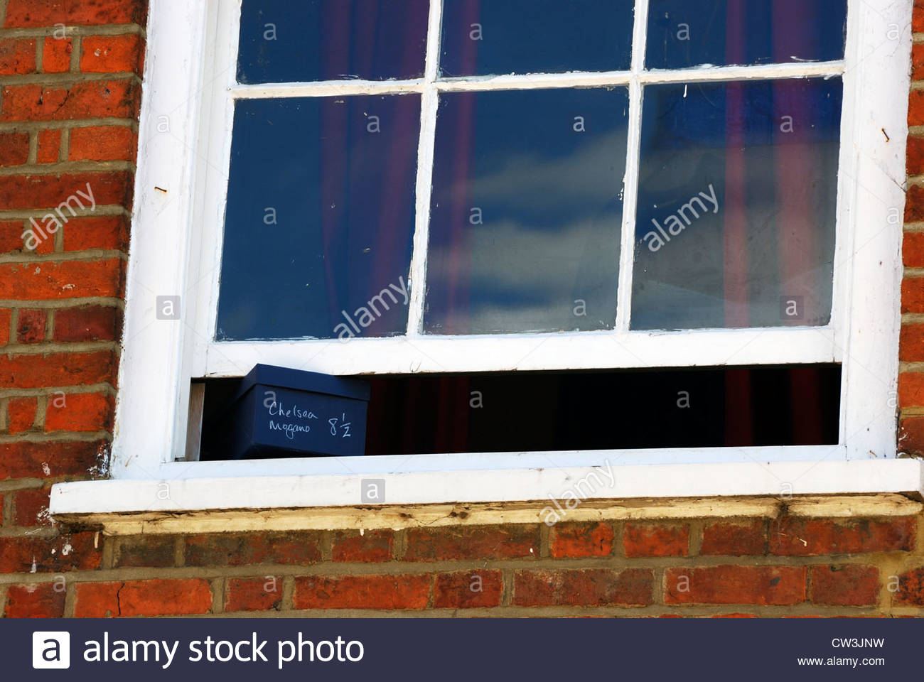 Old sash window propped open with a shoe box, Buckingham Stock Photo ...
