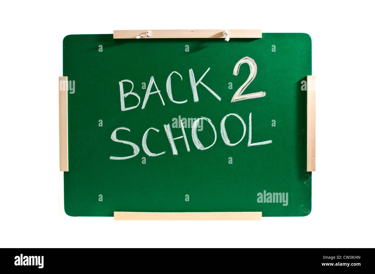 Back to school note written with white chalk on a green chalkboard ...