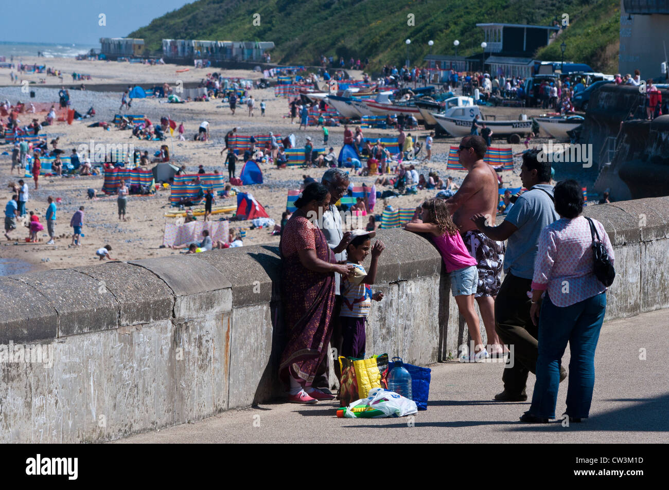 Indian Asian family on holiday at the seaside Stock Photo