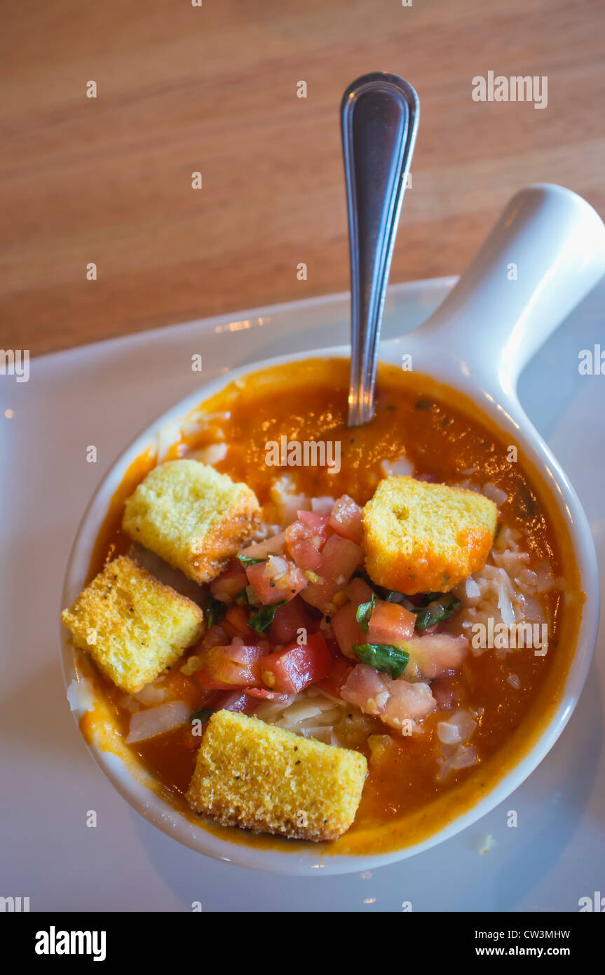 Bowl of hearty tomato soup with croutons Stock Photo