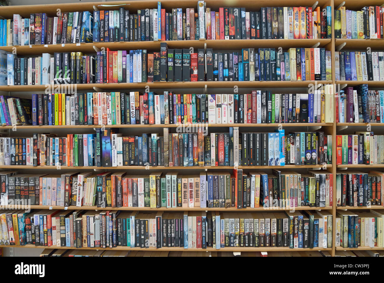 Shelves of books in second-hand bookstall, Newport Indoor Market, Newport, South Wales, Wales, United Kingdom Stock Photo