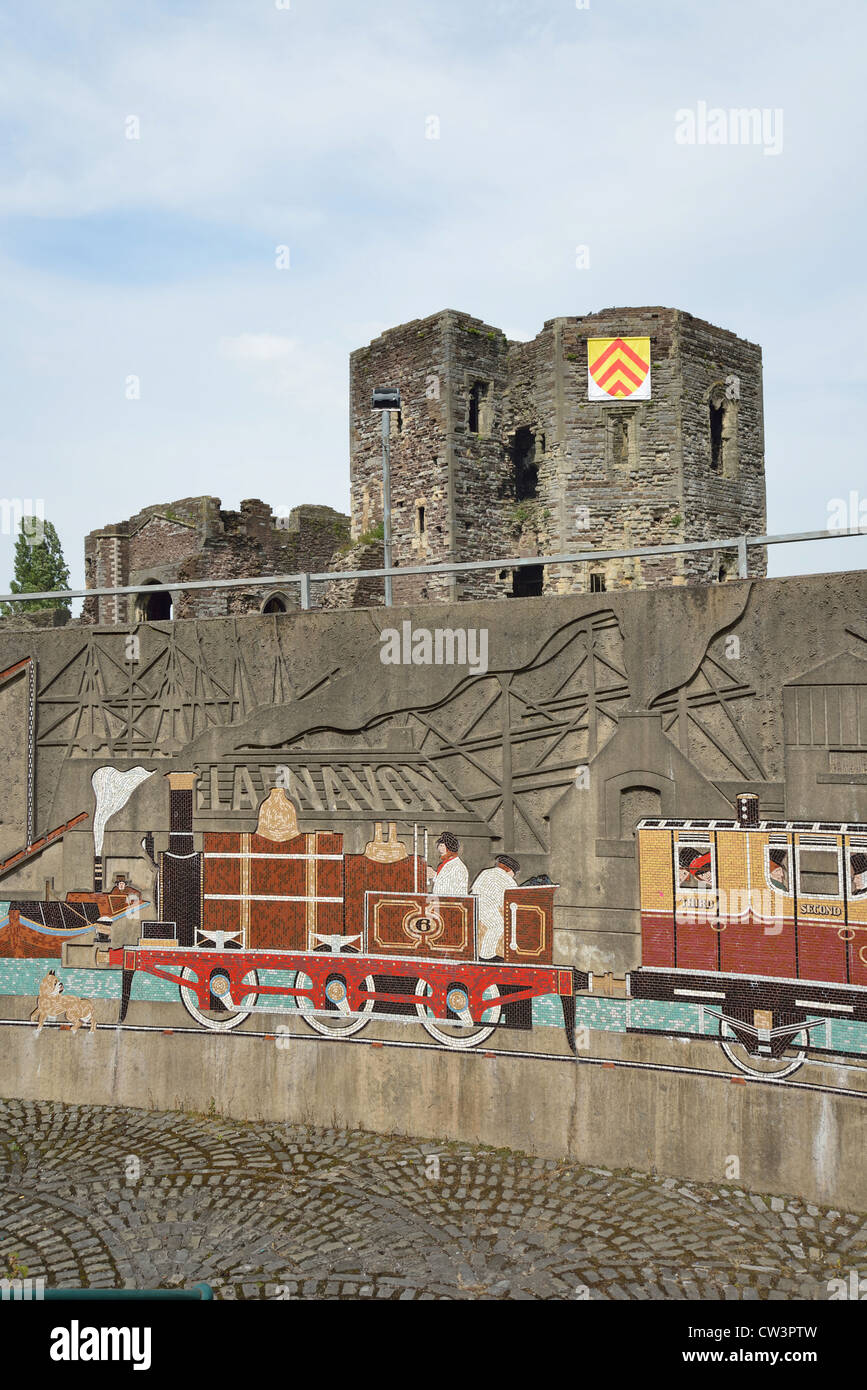 Railway mural on pedestrian underpass and Newport Castle, City of Newport (Casnewydd), Wales (Cymru), United Kingdom Stock Photo