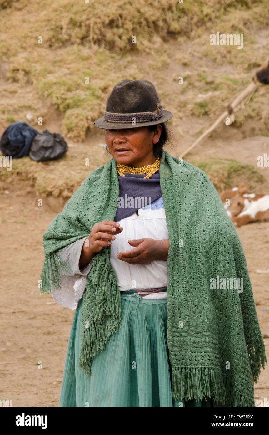 Ecuador, Quito area. Otavalo Livestock Market. Otavalenos woman in traditional highland attire. Stock Photo
