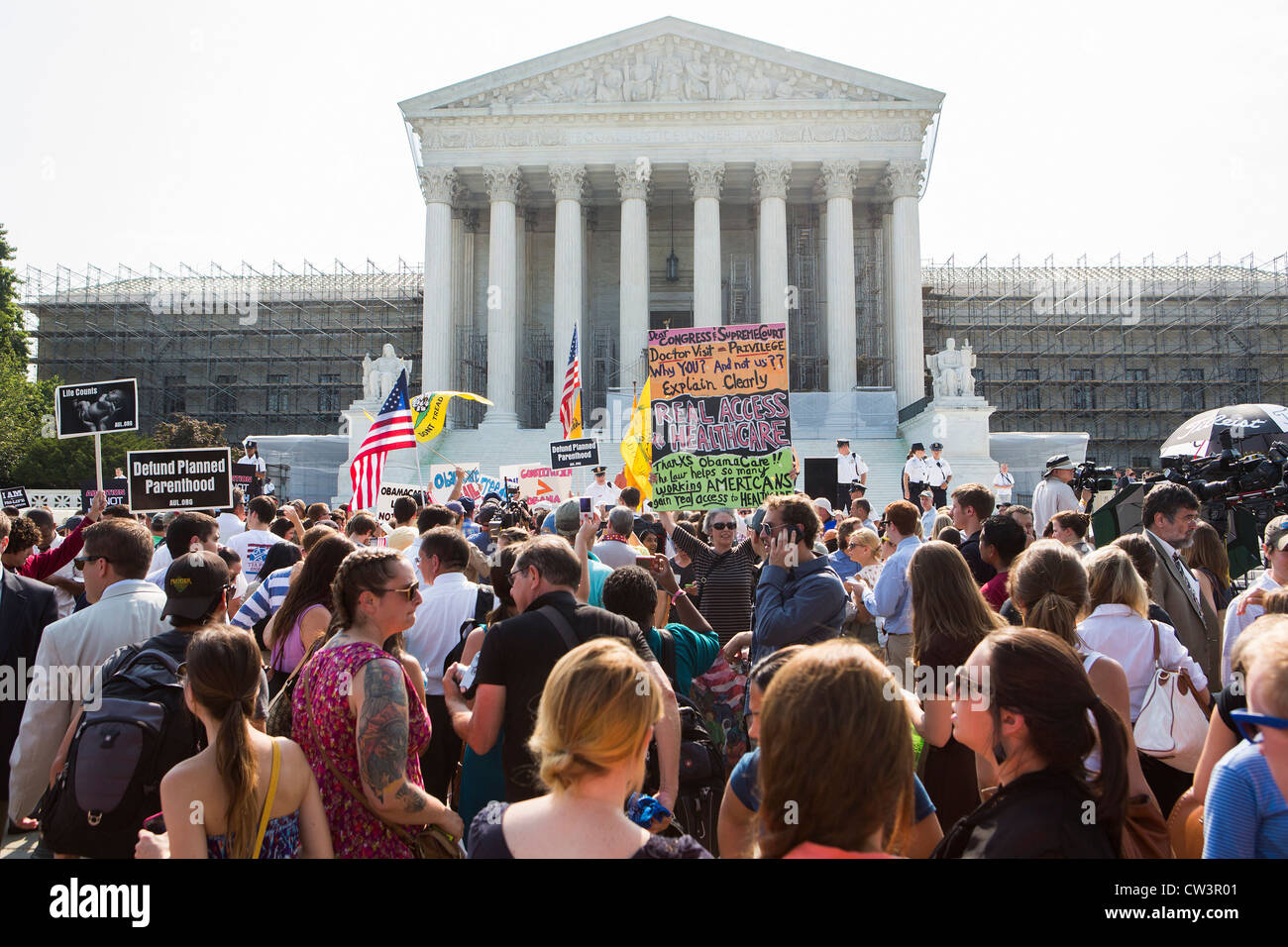 Protestors outside of the Supreme Court Building the day of the healthcare case announcement. Stock Photo