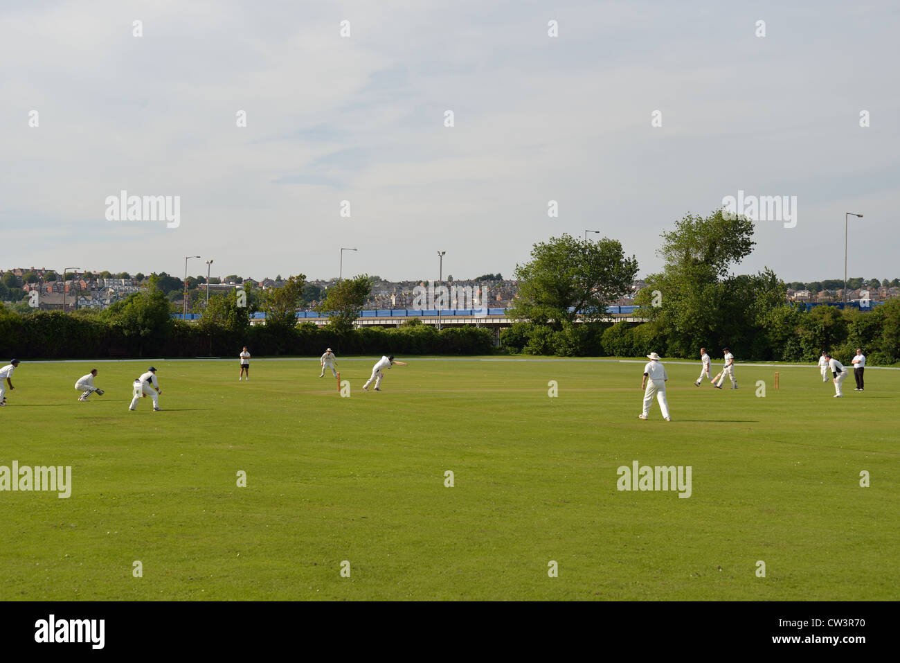 Cricket match by seafront, Barry Island, Barry, Vale of Glamorgan, Wales, United Kingdom Stock Photo