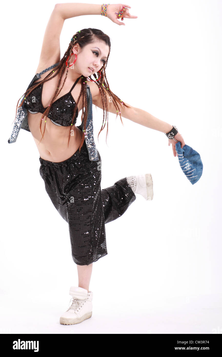 Cute girl in various dance costumes and fun poses. Stock Photo