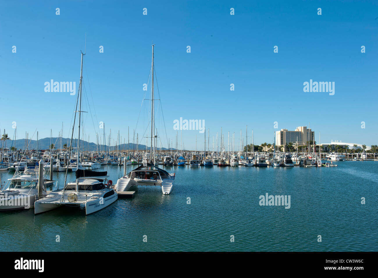 Breakwater Marina with yachts, sailboats, and motorboats at The Strand, the beach promenade of Townsville, Far North Queensland Stock Photo