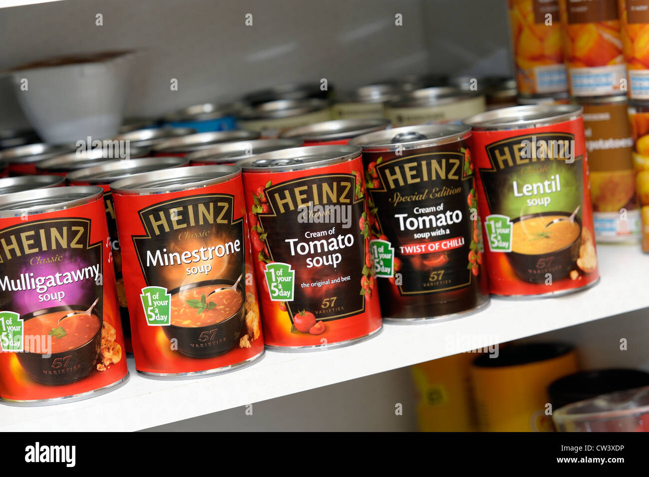 tins of soup in a kitchen cupboard england uk Stock Photo Alamy