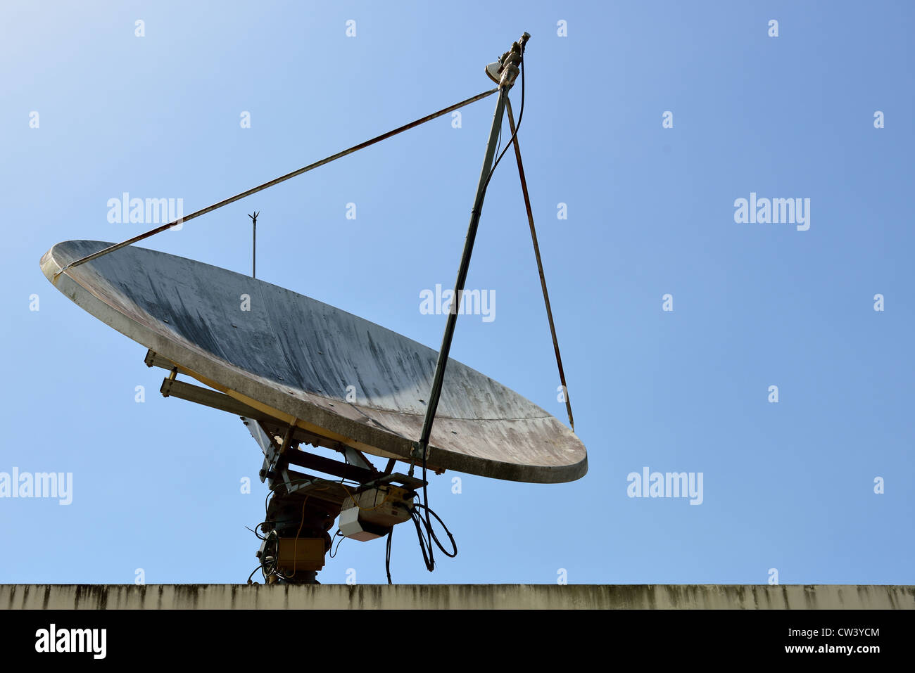 The satellite dish is set on the high building Stock Photo