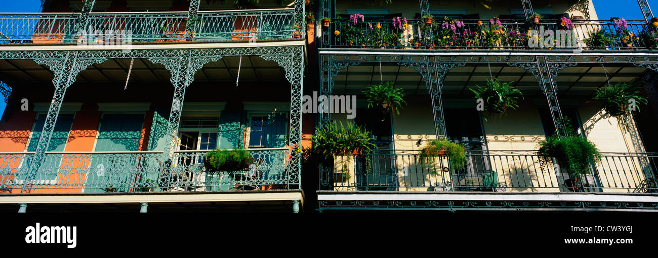 This shows two buildings in historic French Quarter on Bourbon Street ...