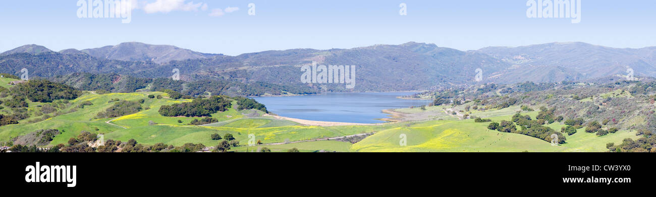 Elevated panoramic view of Lake Casitas and green fields in spring, shot from Oak View, near Ojai, California Stock Photo