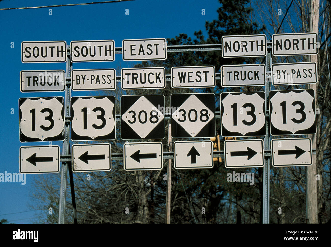 This set road signs offering directions fork in road. It points out