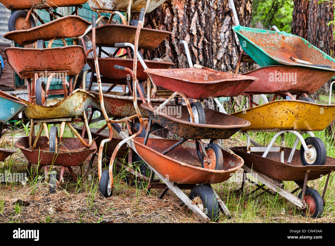 USA, Washington State, Cle Elum, Stacked Rusty Wheelbarrows Stock Photo