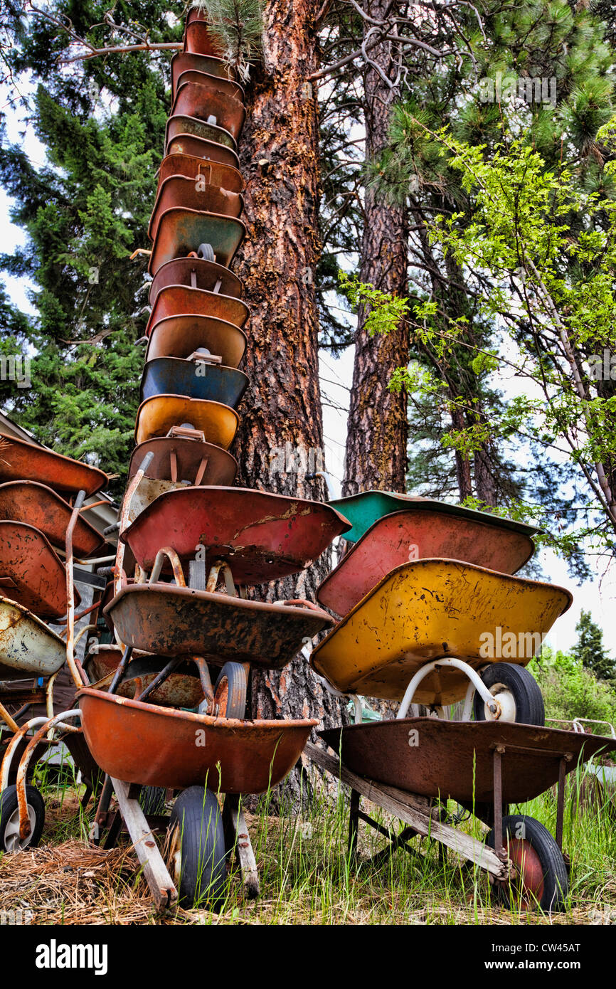 USA, Washington State, Cle Elum, Stacked Rusty Wheelbarrows Stock Photo