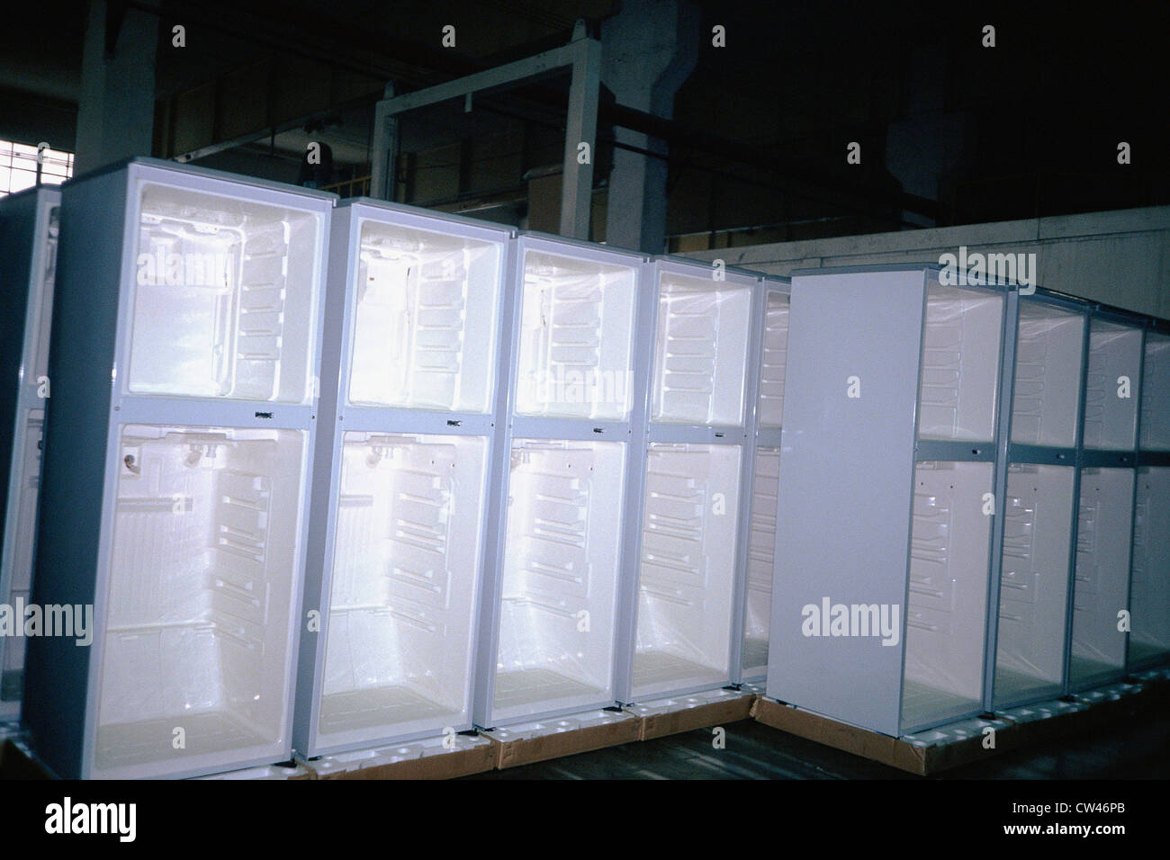 Rows of refrigerators without doors Stock Photo Alamy