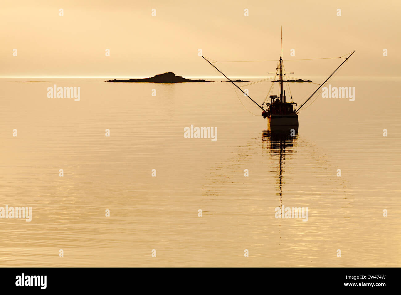 USA, Alaska, Inian Islands, Fishing Boat at Sunset Stock Photo