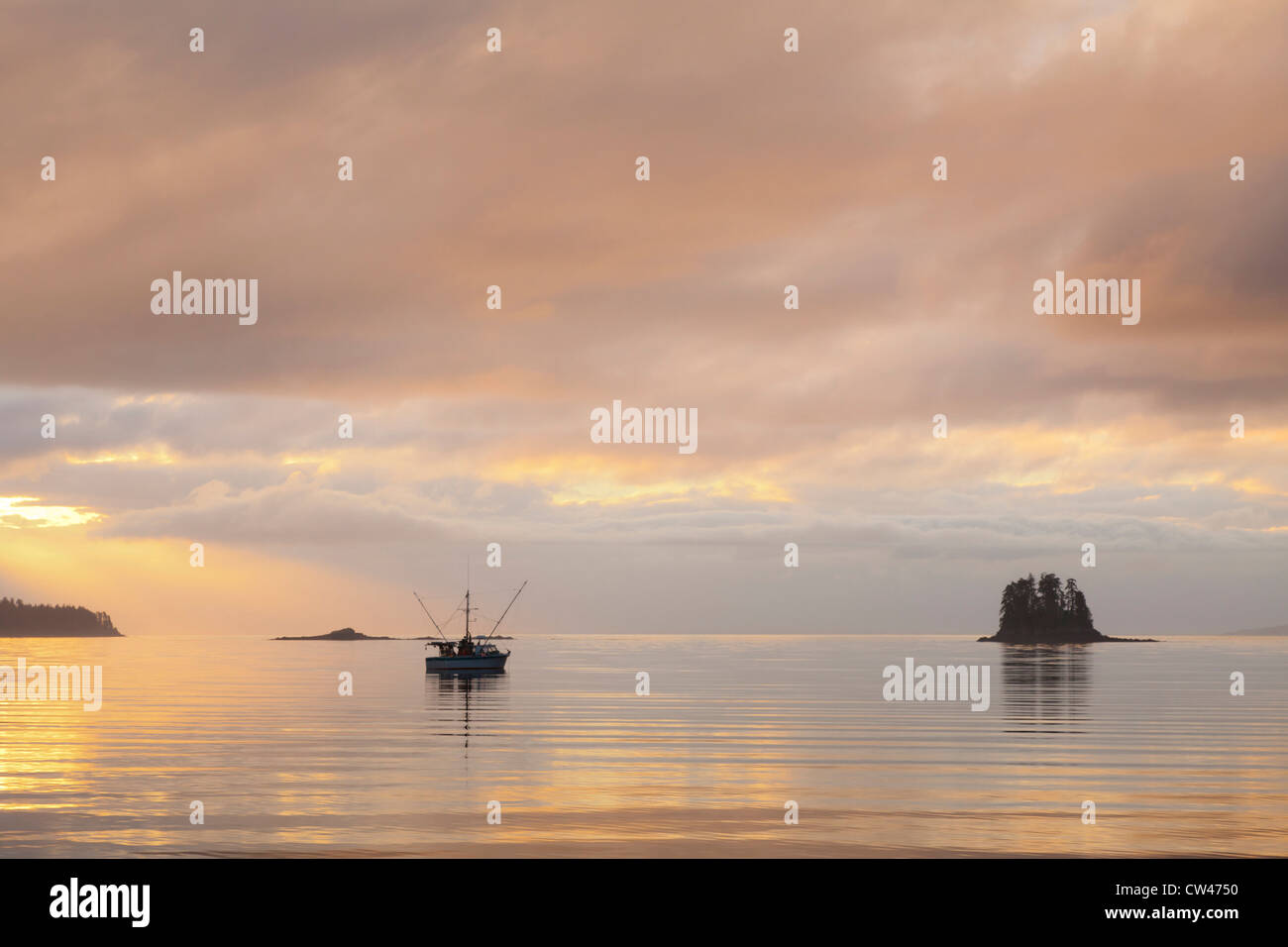USA, Alaska, Inian Islands, Fishing Boat at Sunset Stock Photo