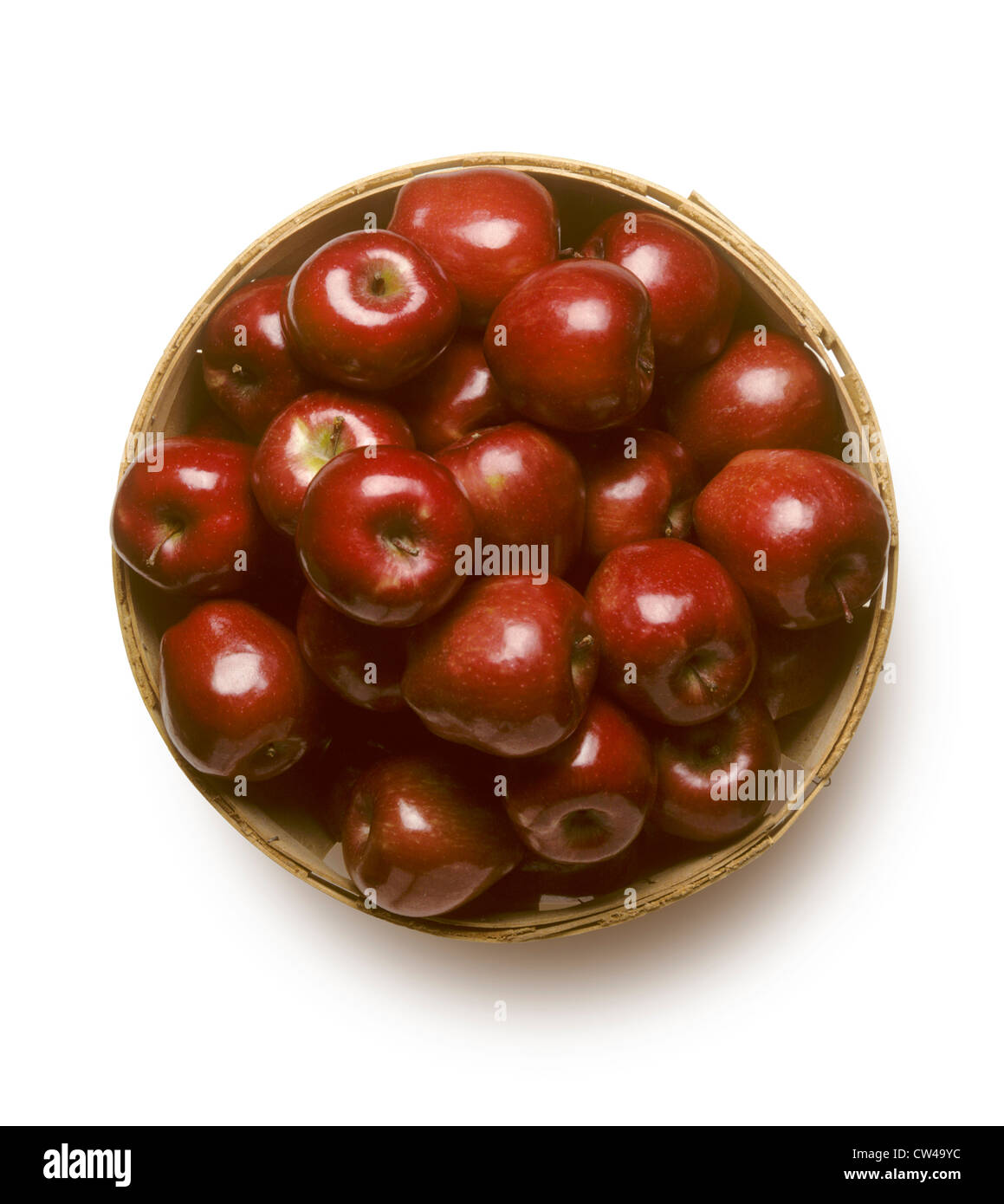 Bushel basket of Red Delicious apples isolated on white background Stock Photo