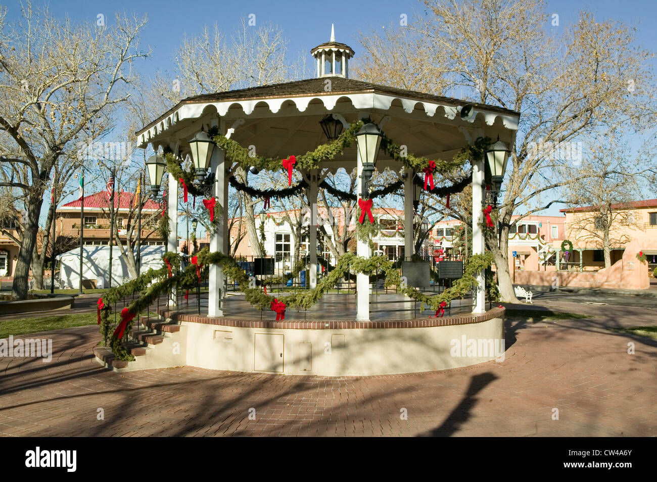 Gazebo wrapped in Christmas décor is in park in Old Town of Albuquerque