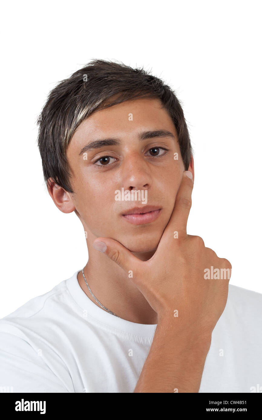young swarthy man with brown eyes Thinking about something on white background Stock Photo