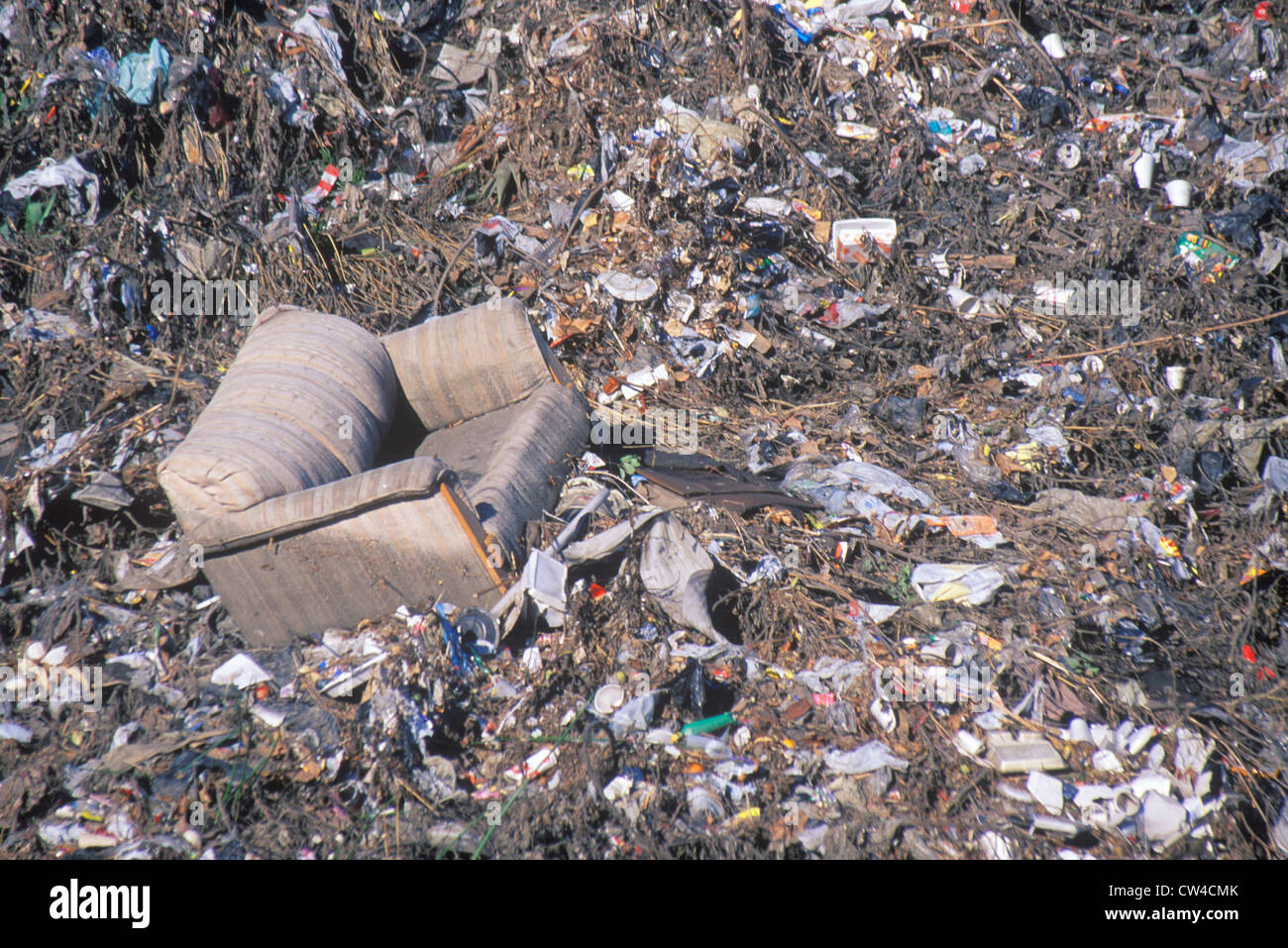 A couch in the middle of an undesignated dump in Compton, California