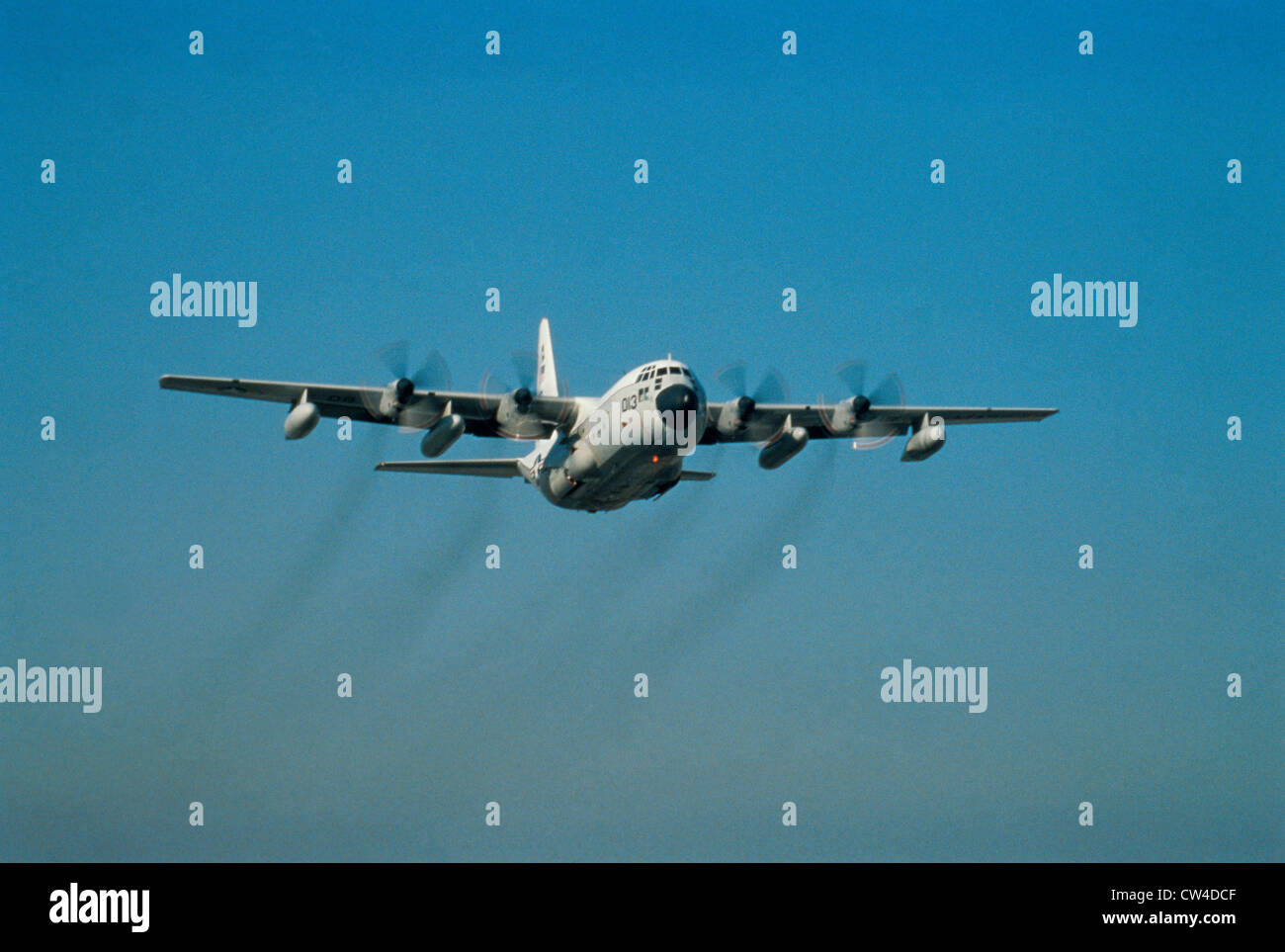 Low angle view of a C-130 Hercules in flight Stock Photo