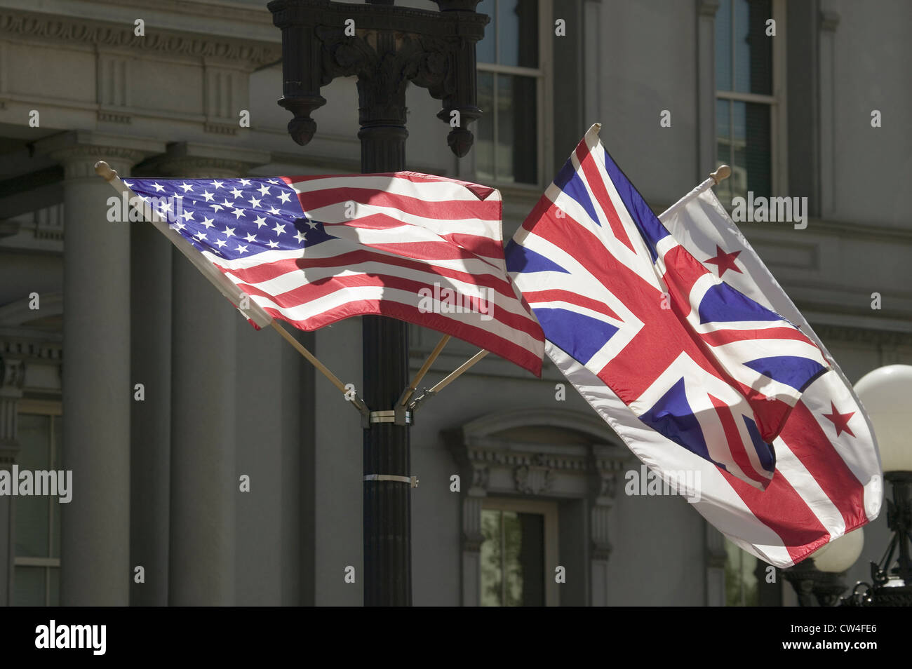 American Flag hanging with Union Jack British Flag next to White House ...