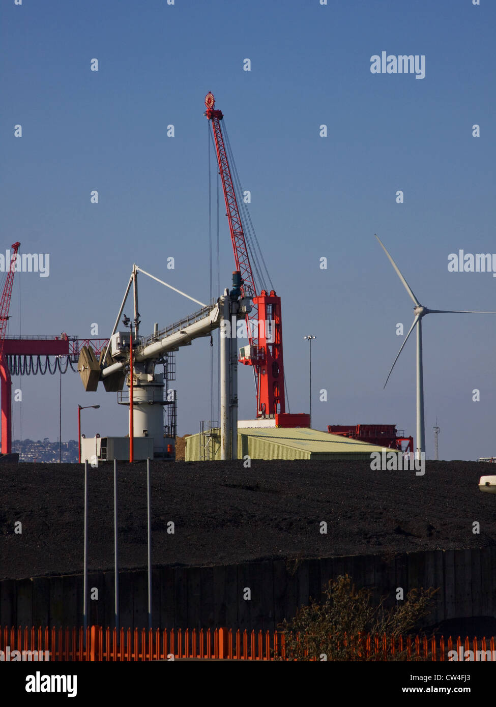 Alternative energy sources of coal and wind alongside each other at