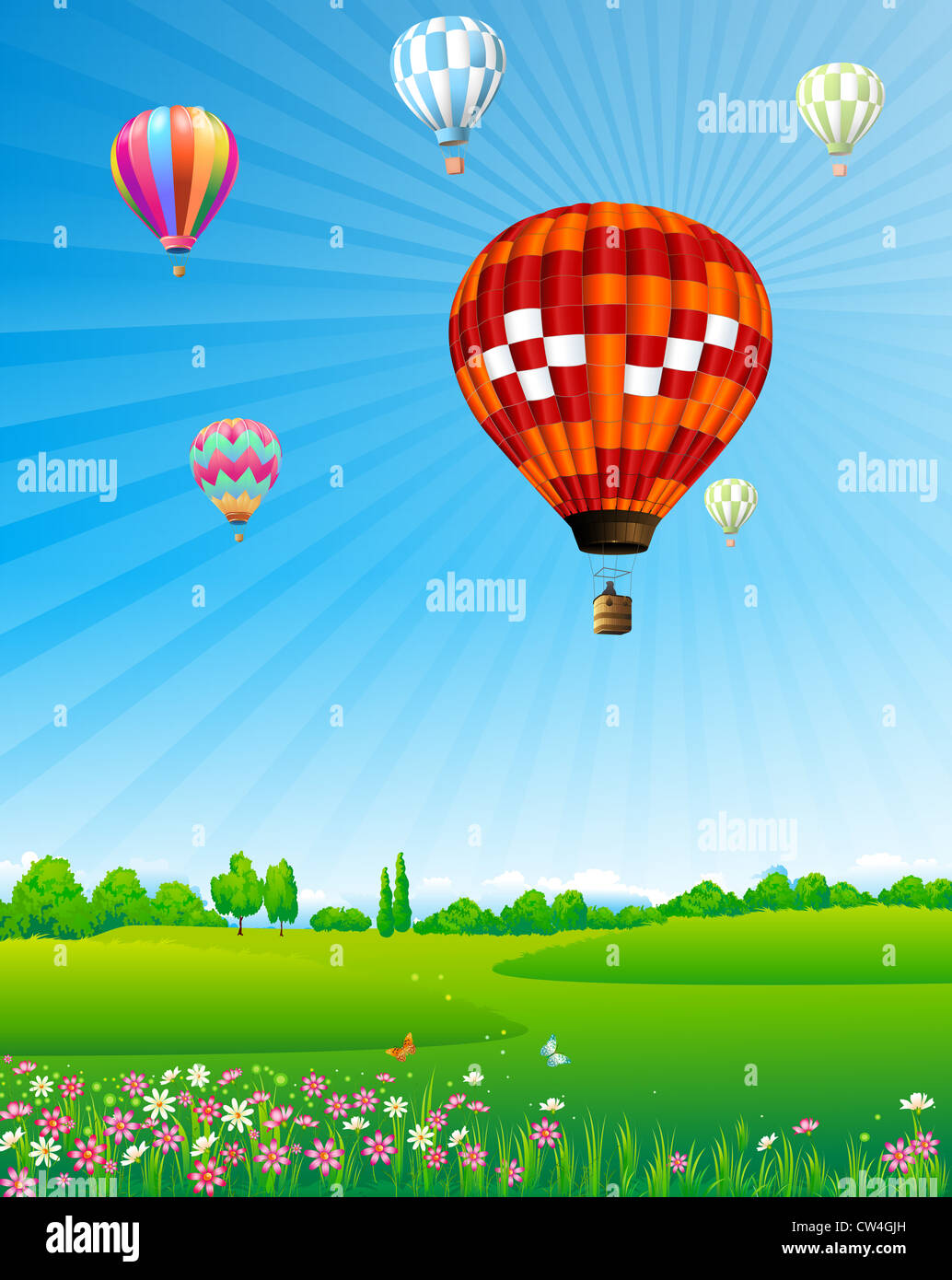 Hot air balloons floating over green field Stock Photo