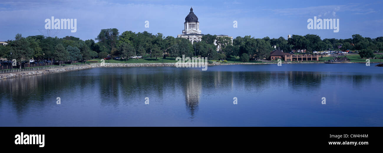 Panoramic view of lake with view of South Dakota State Capitol and