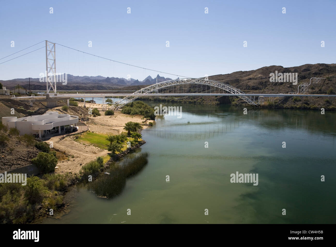 Bridge crossing Colorado River with turquoise color water from Needles
