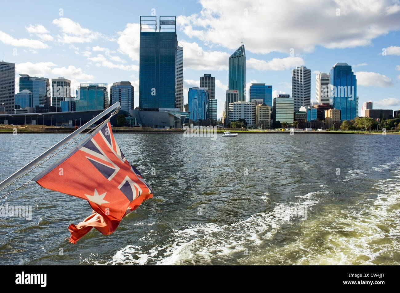 Perth Western Australia - The Australian Red Ensign flown on a boat as it sails past the city of Perth Stock Photo